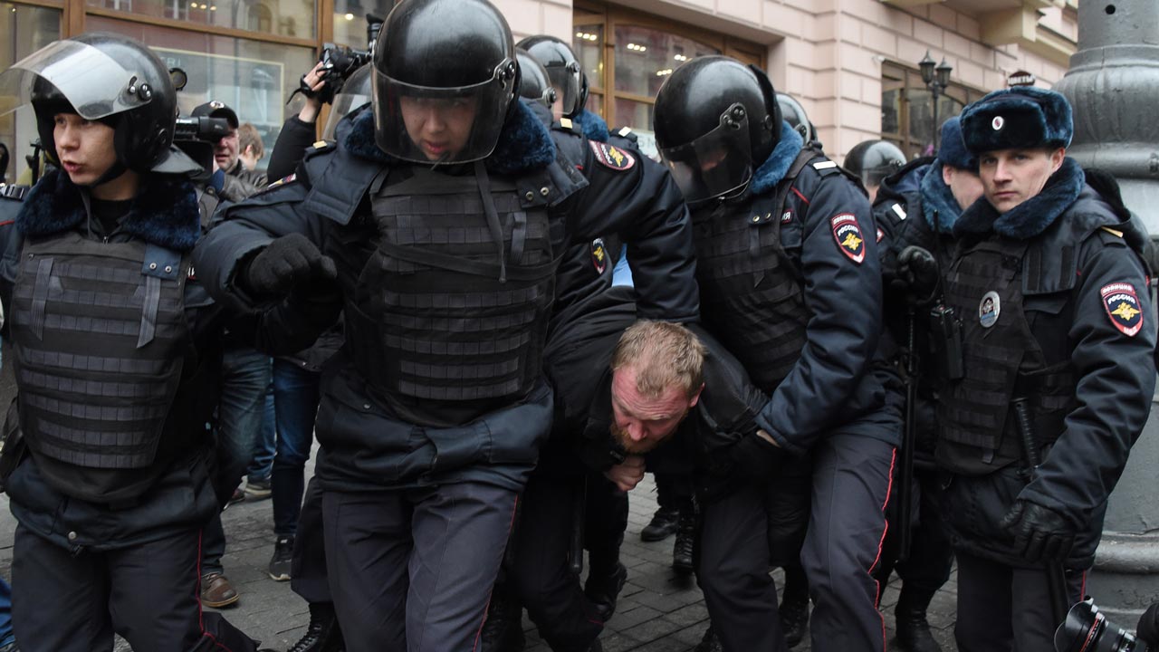 Russian police detain dozens of opposition deputies at forum
