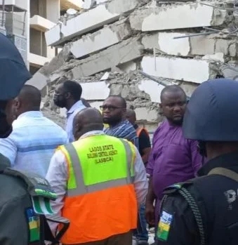 Police officers and some Lagos State government officials at the scene of the Ikoyi building collapse